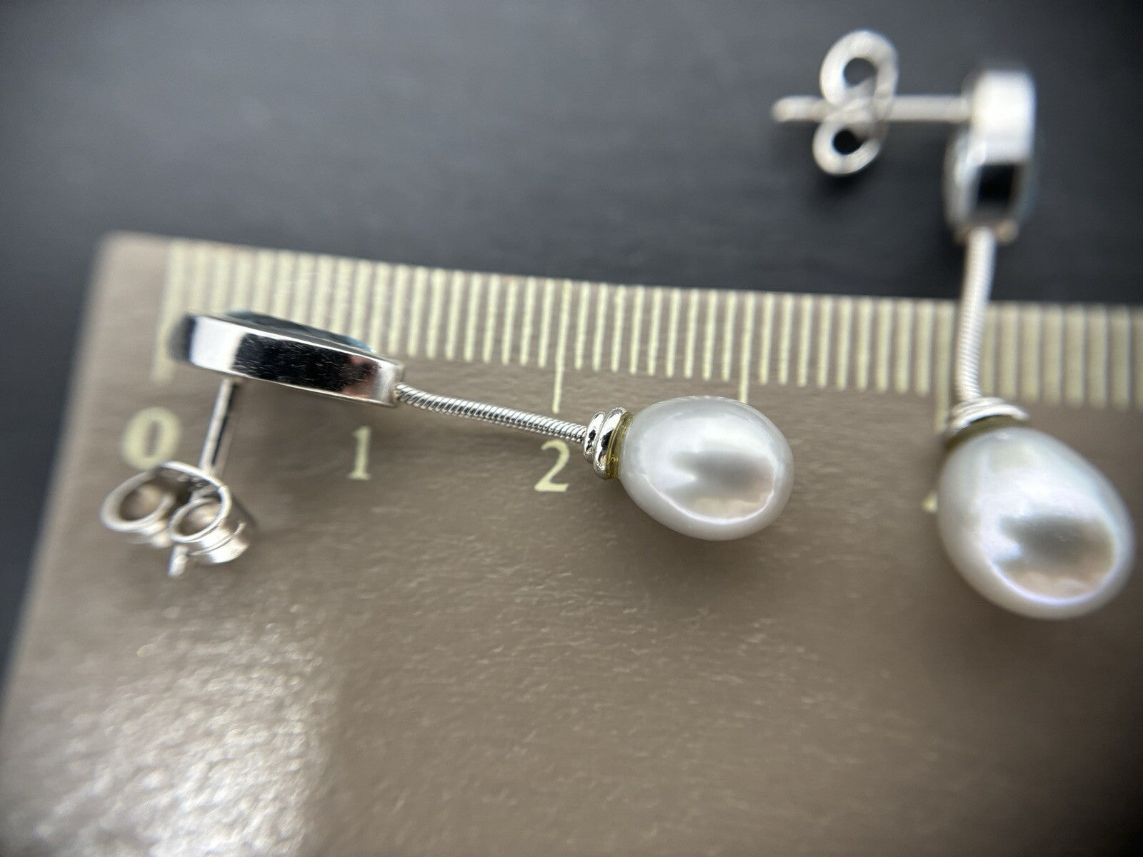 Ohrringe 14Karat Weißgold mit Blautopasen und Perlen 